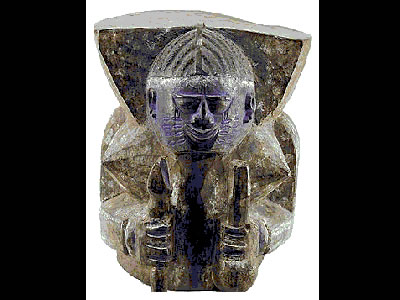 <a href="/mythology/shango_storm.html&lang=sp">Shango</a> era el dios frontal del antiguo imperio Oyo, el centro de cultura y poltica del pueblo Yoruba en frica Oeste. Despus de su muerte, se fue conocido como el dios del <a 
href="/earth/Atmosphere/tstorm/tstorm_lightning.html&lang=sp">trueno y el rayo </a>. En el arte es frecuentemente representado con un hacha doble ensu cabeza, el smbolo del rayo, o como un fiero carnero. 
<p><small><em>Imagen Cortesa de la Galera Hamill de Arte Africano, Boston, MA</em></small></p>
